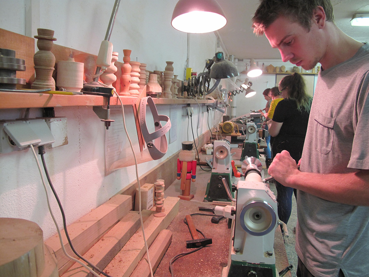 Photo shows course in the woodturning workshop