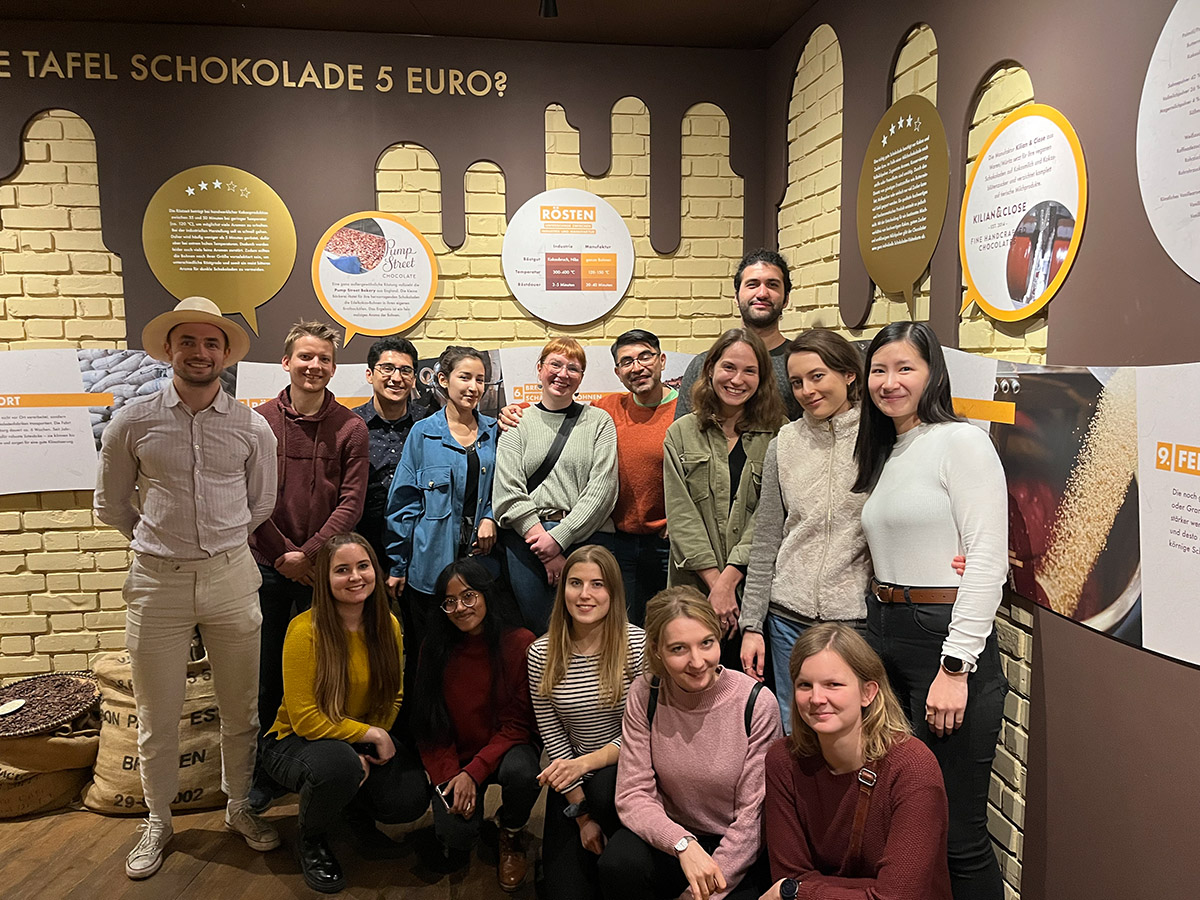 Group of students standing in the corner of the chocolate museum